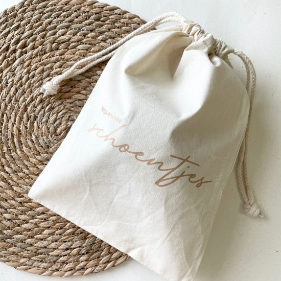 Bewaarzak eerste schoentjes gevuld