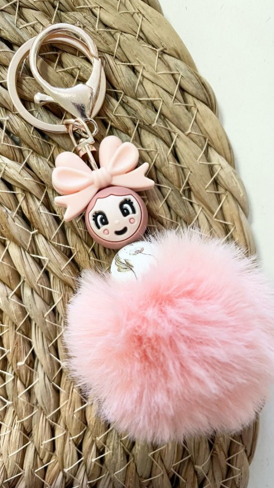 Popje koraal met strik