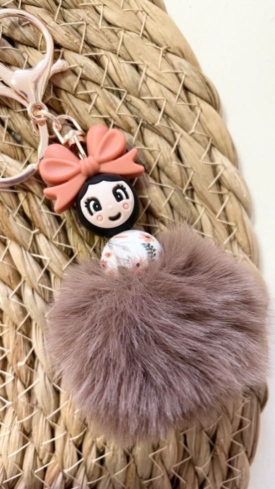 Popje papaya met strik