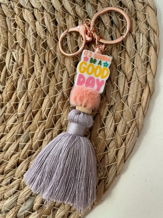 Sleutelhanger kwast paars good day